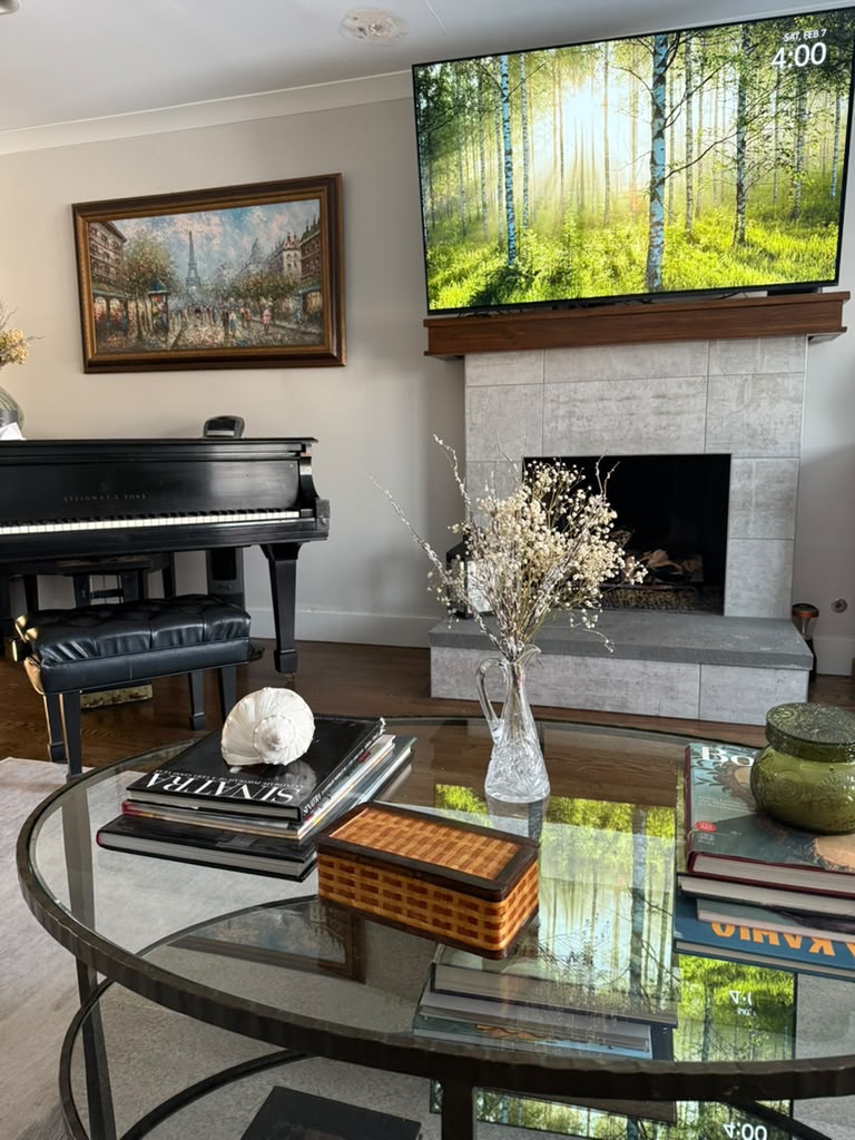Classic living area with grand piano and fireplace